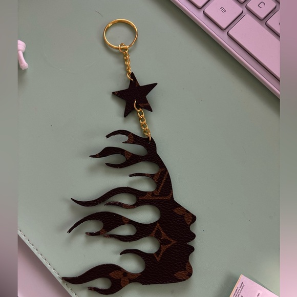 Louis Vuitton Accessories - Louis Vuitton Brown Flame Face Key Holder with Star